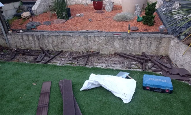 pose pierre de parement imitation ardoise dans un jardin vue sur la terrasse a saint Ouen l aumône , Cergy, Entreprise Dargent Laurent
